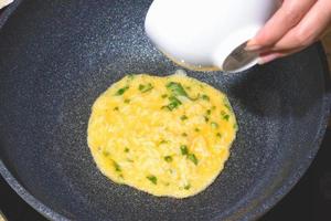 Sun Egg Recipe by His Majesty the King of Thailand, omelets wite rice, Khai Phra Arthit photo