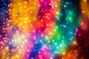 bokeh effect glitter colorful blurred abstract background for birthday, anniversary, wedding, new year eve or Christmas photo