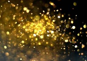 Golden glitter bokeh lighting texture Blurred abstract background for birthday, anniversary, wedding, new year eve or Christmas photo