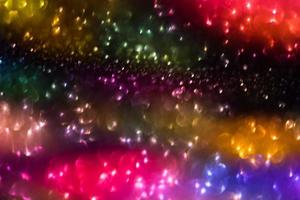 bokeh effect glitter colorful blurred abstract background for birthday, anniversary, wedding, new year eve or Christmas photo