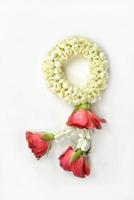 Thai traditional jasmine garland.symbol of Mother's day in thailand on white background. photo