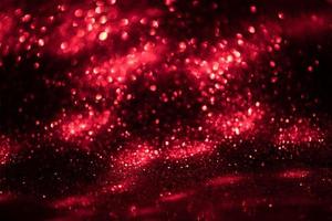 red glitter bokeh lights Blurred abstract background for Valentines, birthday, anniversary, wedding, new year and Christmas photo