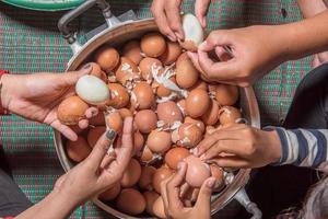 Many hands are Peel a Hard-Boiled Egg. Before you make it Egg and Pork in Sweet Brown Sauce photo