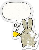 cute cartoon rabbit drinking coffee and speech bubble distressed sticker vector