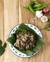 Cumi Cabai Hijau, Stir Fry Squid with Green Chilli Pepper. Indonesian Popular Food Menu photo