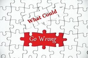 Text on missing jigsaw puzzle - What could go wrong. photo