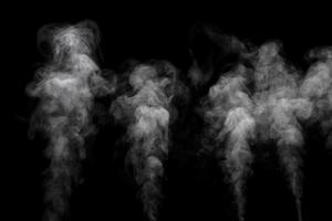 Abstract powder or smoke effect isolated on black background photo