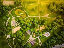 Aerial top view Public park in south part of Siauliai city with people enjoying leisure activities, Lithuania photo