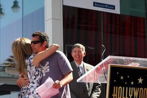 LOS ANGELES, FEB 22 -  Jennifer Aniston, Adam Sandler at the Jennifer Aniston Hollywood Walk of Fame Star Ceremony at the W Hollywood on February 22, 2012 in Los Angeles, CA photo