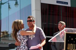 LOS ANGELES, FEB 22 -  Jennifer Aniston, Adam Sandler at the Jennifer Aniston Hollywood Walk of Fame Star Ceremony at the W Hollywood on February 22, 2012 in Los Angeles, CA photo