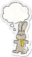 cartoon rabbit and thought bubble as a distressed worn sticker vector