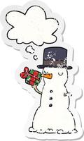 cartoon snowman and thought bubble as a distressed worn sticker vector