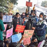 New Delhi, India December 25 2021 - Delhi Contractual Guest Teachers with posters, flags and graffitis protesting against Delhi AAP Government for making policy, Delhi Guest Teachers protesting photo