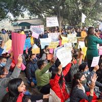 New Delhi, India December 25 2021 - Delhi Contractual Guest Teachers with posters, flags and graffitis protesting against Delhi AAP Government for making policy, Delhi Guest Teachers protesting photo