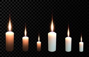 Vector set of realistic wax burning candles isolated on a transparent background.