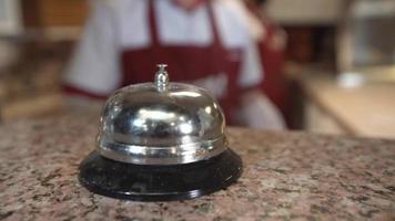 Bell ringing cook. The master who pressed the restaurant reception bell. The master who rings the bell when the food is ready. video