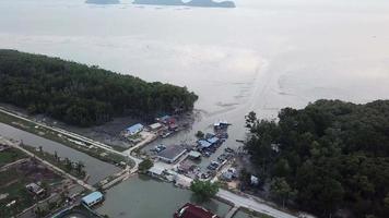 Aerial view Malays fishing village in evening at Sungai Semilang. video