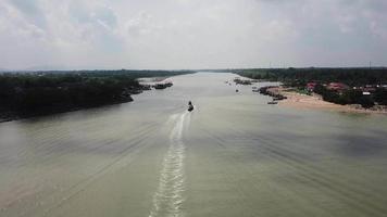 Busy traffic boats moving at Kuala Muda. video