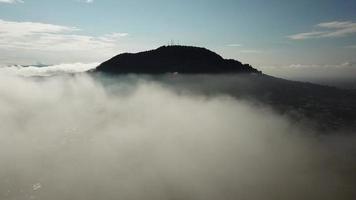 Aerial reveal the small town at Bukit Mertajam by fly over the white cloud video