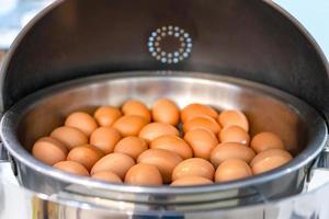 boiled egg in large white square bowl at Thailand resort. photo