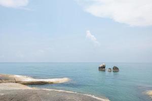 Sea landscape with rocks in the foreground and sky in the background. Therapeutic natural scenery gives a feeling of relaxation. At Koh Samui, Surat Thani Province, Thailand photo