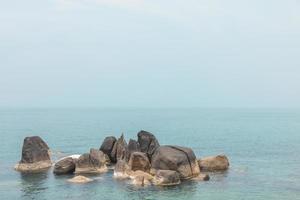 Sea landscape with rocks in the foreground and sky in the background. Therapeutic natural scenery gives a feeling of relaxation. At Koh Samui, Surat Thani Province, Thailand photo