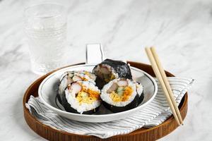 Homemade Gimbap Korean Rice Roll with Nori Laver, Egg, Sesame Seed, and Vegetable