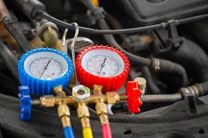 Air conditioning manifold gauges for check the pressure and leak on car air condition systems photo