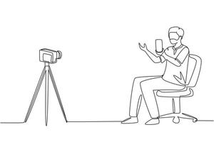 Continuous one line drawing Arab blogger review new smartphone on dslr camera. Live stream broadcast channel. Man holding mobile phone for review product. Single line draw design vector illustration