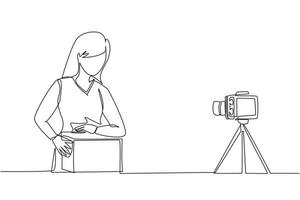 Continuous one line drawing beauty female show unboxing received package in live at home. Woman vlogger unboxing product and recording review on camera. Single line draw design vector illustration