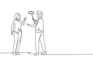 Single continuous line drawing girl makes video blog with cameraman on the street. Young woman blogger, journalist filming with smartphone and videographer. One line draw design vector illustration