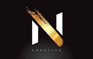 Golden N Letter Logo with Brush Stroke Artistic Look on Black Background Vector