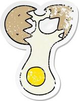 distressed sticker of a quirky hand drawn cartoon cracked egg vector