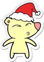 sticker cartoon of a whistling bear wearing santa hat vector