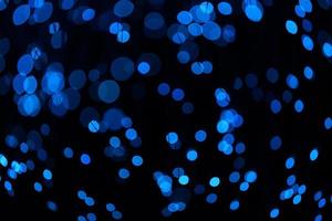 Fantastic blurry and bokeh dark blue theme background in the mystry cave. photo