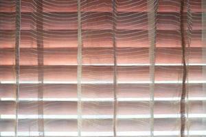 red orange pink curtain transperance from outside light with spar aromatherapy mood and tone. photo