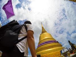 Asian traveler selfies with golden mount, Bangkok, Thailand. photo