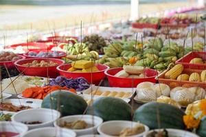 Asian believing, pray with incense and foods. photo