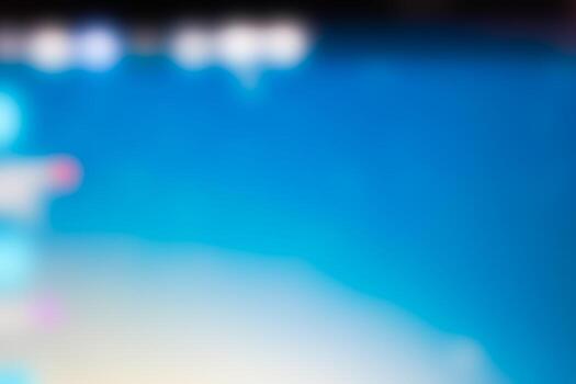 Abstract blur blue and black on the top of image and some texture and object color on the left side. photo