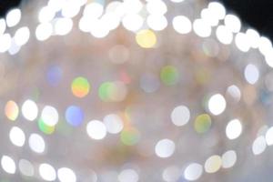 Blurry yellow rainbow chandelier and bokeh for luxury or happy holiday background. christmas, new year, birthday, anniversary event background photo