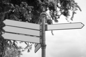 Black and White direction pole. photo