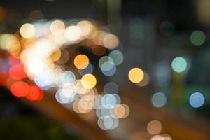 gold, red, white, gray etc., blurry bokeh light in the expressway view Bangkok cityscape for background. photo