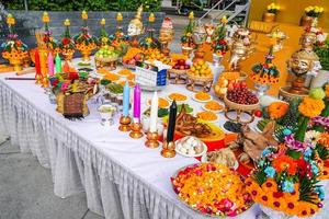 The Sacrifice objects set for the Thai filming project. They prepare in front of the spiritual landlord statue and asking for the successful project. photo