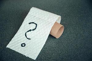 Last piece of toilet paper with question mark photo