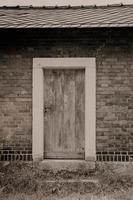 Rectangular doorway on brick building photo