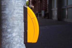 a pedestrian traffic light with push button photo