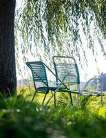 summer chairs in the garden photo