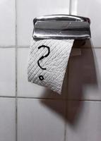 Toilet paper with hand drawn question mark photo