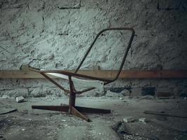 a broken rusty chair photo