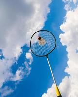 Badminton racket with a view of the sky photo